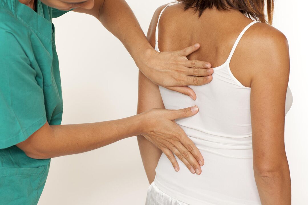 The doctor examines the back to see if there is shoulder pain